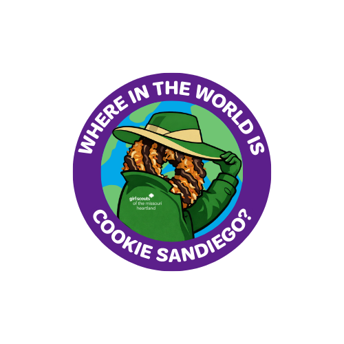 cookie sandiego patch with a Caramel Delite cookie wearing a green trenchcoat and hat, with the words "WHERE IN THE WORLD IS COOKIE SANDIEGO?"  circling the outer border of the patch.